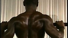 Fully naked, the black dude shows off his awesome ripped body