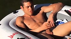 Handsome stud goes off into a lake to jack off completely naked