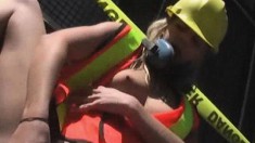 Wild blonde in a construction uniform fucks herself with toys outside